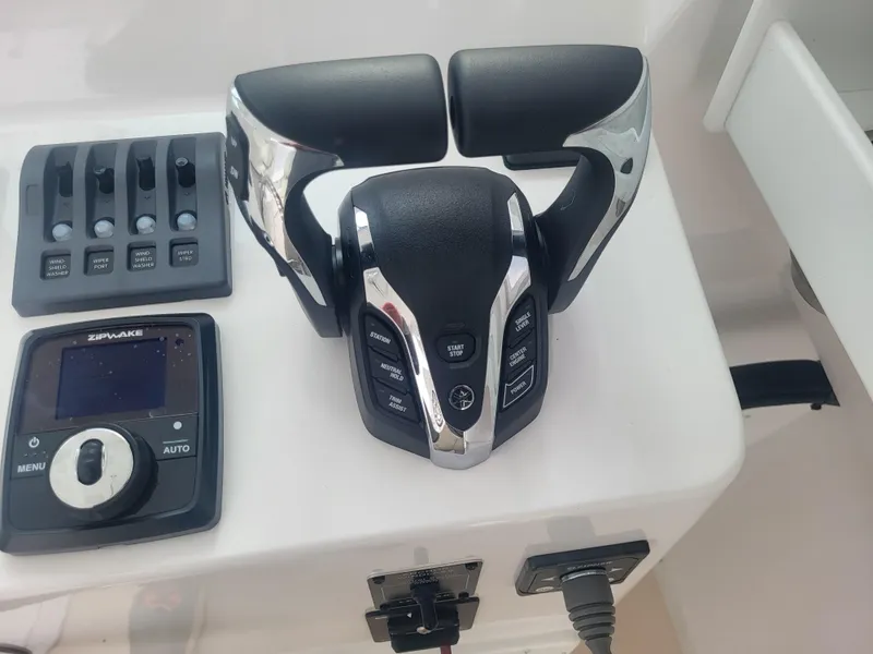 Slide: The Image of 2025 Steiger Craft 28 Fisherman boat controls and dashboard instruments. - 19