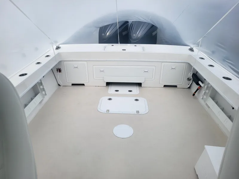 Slide: The Image of 2025 Steiger Craft 28 Fisherman boat interior with spacious deck and dual engines. - 7