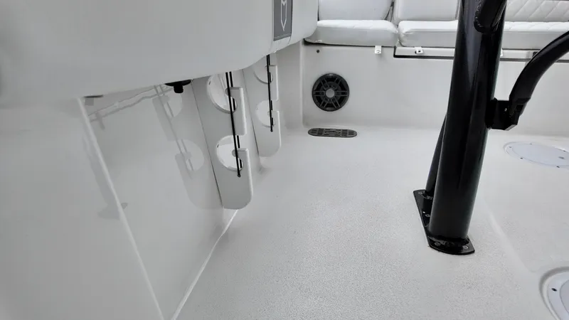 Slide: The Image of Interior view of 2025 Sea Fox 228 Commander boat, featuring rod holders and seating. - 14