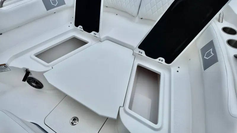 Slide: The Image of 2025 Sea Fox 228 Commander boat interior with open storage compartments. - 28