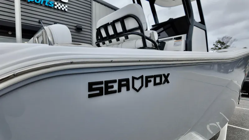 Slide: The Image of 2025 Sea Fox 228 Commander boat, sleek design, close-up view. - 5
