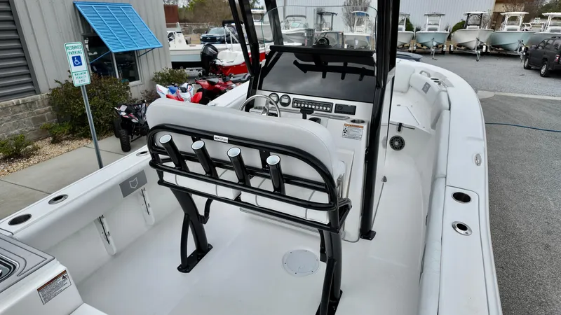 Slide: The Image of 2025 Sea Fox 228 Commander boat interior with seating and control panel. - 9