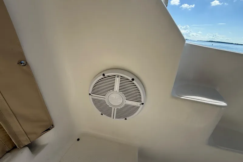 Slide: The Image of Tiara Yachts 4500 Sovran 2014, interior view with open hatch, marina background. - 10