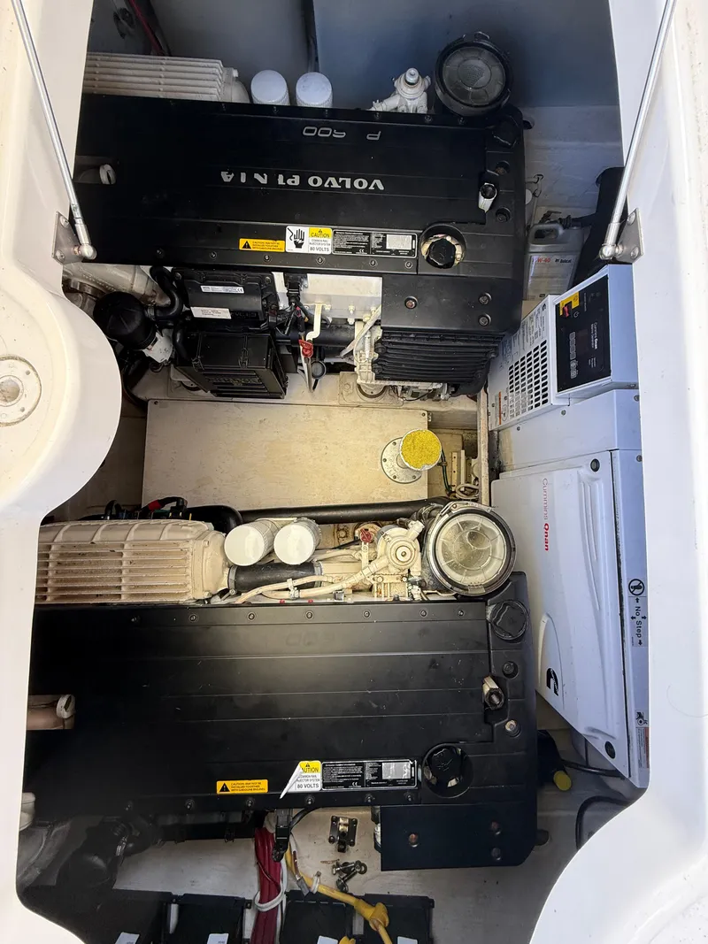 Slide: The Image of Engine room of 2014 Tiara Yachts 4500 Sovran with battery setup and control panel. - 14