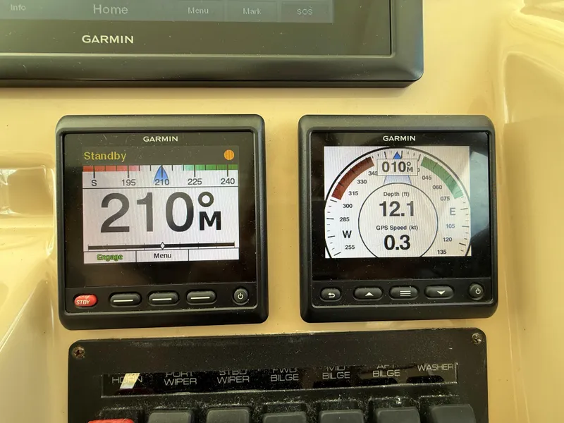 Slide: The Image of Garmin navigation system and Lenco controls on 2014 Tiara Yachts 4500 Sovran. - 28