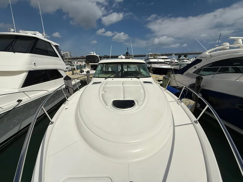 Slide: The Image of 2014 Tiara Yachts 4500 Sovran with Garmin radar, under a clear blue sky. - 67