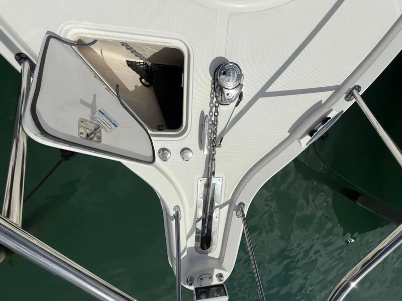 Slide: The Image of 2014 Tiara Yachts 4500 Sovran, white deck view, docked under blue sky. - 69