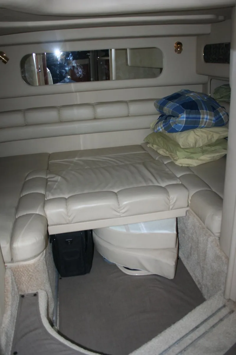 Slide: The Image of Engine compartment of a 1999 Sea Ray 400 Sundancer boat, featuring a V8 engine. - 22