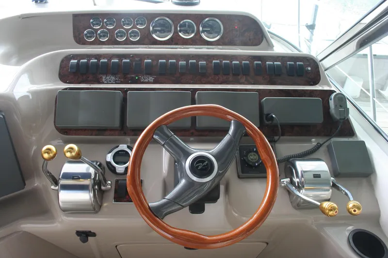 Slide: The Image of Raytheon NAV398 GPS display on 1999 Sea Ray 400 Sundancer boat dashboard. - 30