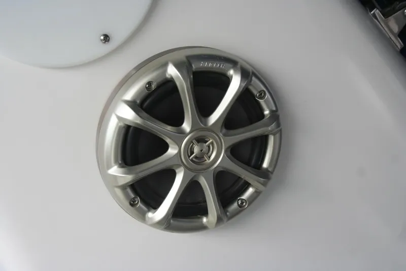 Slide: The Image of White leather seating on 1999 Sea Ray 400 Sundancer boat interior. - 36