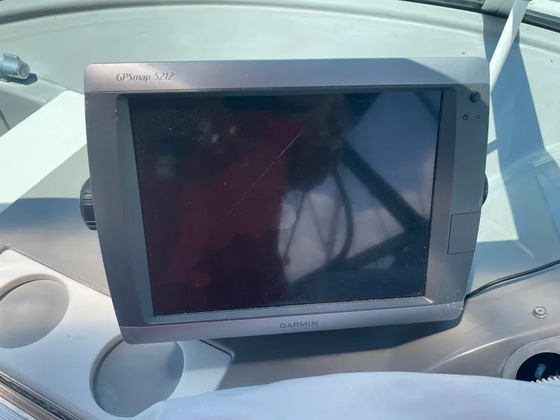 Slide: The Image of Garmin GPSmap 5212 on 2000 Carver 350 Mariner boat dashboard. - 13