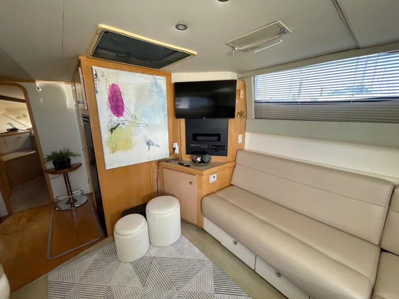 Slide: The Image of Interior cabin of 2000 Carver 350 Mariner yacht with bed and porthole windows. - 24