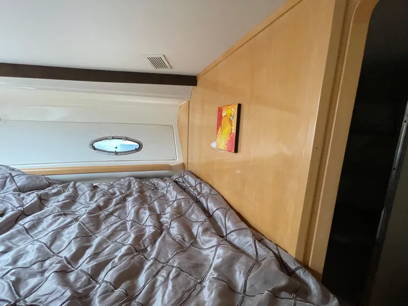 Slide: The Image of Interior of 2000 Carver 350 Mariner yacht with modern kitchen and cozy seating area. - 27