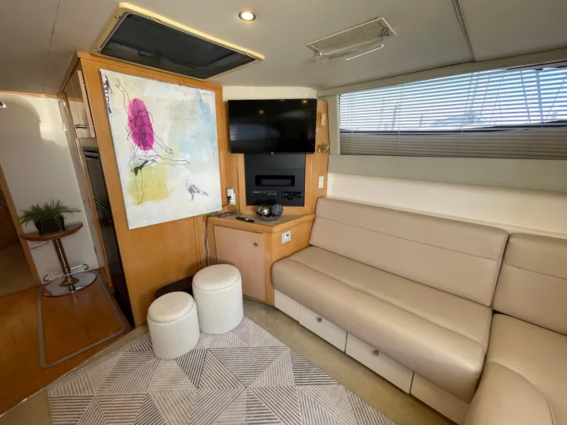 Slide: The Image of Interior cabin of 2000 Carver 350 Mariner yacht with cozy bed and storage. - 33