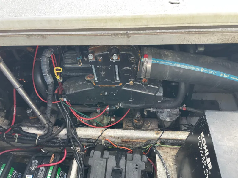 Slide: The Image of 2000 Carver 350 Mariner yacht docked in Kemah, Texas, with "The Linda Gail" on the stern. - 38