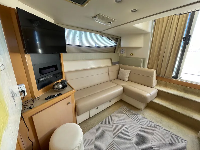 Slide: The Image of Interior cabin of 2000 Carver 350 Mariner with bed and porthole window. - 25