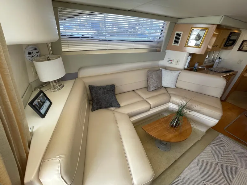 Slide: The Image of Interior of 2000 Carver 350 Mariner yacht with modern seating and decor. - 31