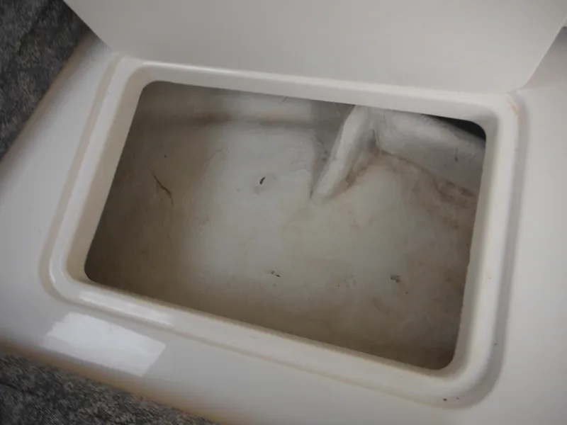 Slide: The Image of Storage compartment in 1999 Robalo 2440 Walkaround boat. - 31