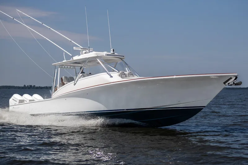 The Image of 2026 Albemarle 45 Carolinian boat on blue ocean with city skyline in background. - 0