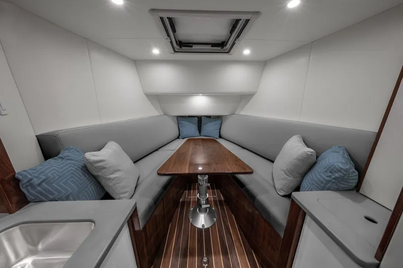 Slide: The Image of 2026 Albemarle 45 Carolinian helm with luxurious seating and ocean view. - 12