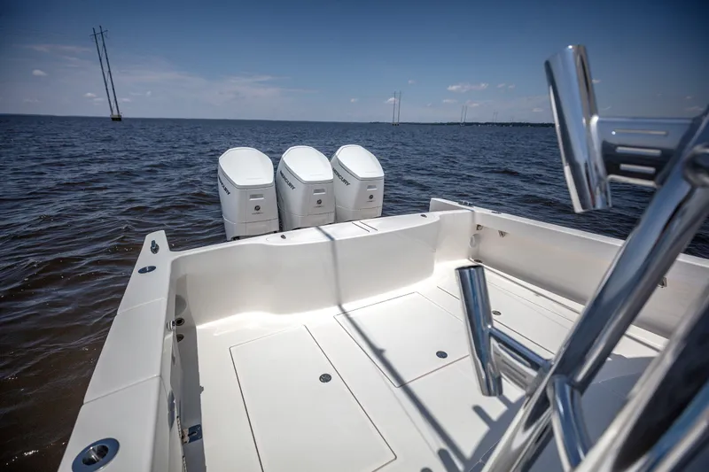 Slide: The Image of Interior of 2026 Albemarle 45 Carolinian yacht with elegant seating and wooden table. - 16