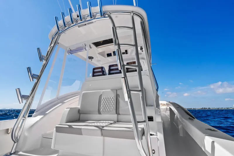 Slide: The Image of 2026 Albemarle 45 Carolinian boat with sleek design on open water. - 21