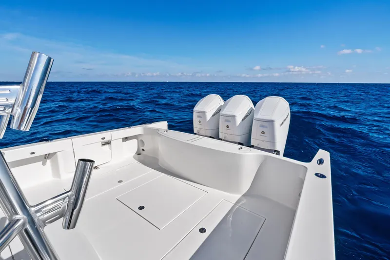 Slide: The Image of 2026 Albemarle 45 Carolinian boat with triple outboard motors on open sea. - 24