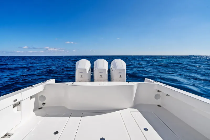 Slide: The Image of 2026 Albemarle 45 Carolinian boat with triple engines on open ocean. - 25