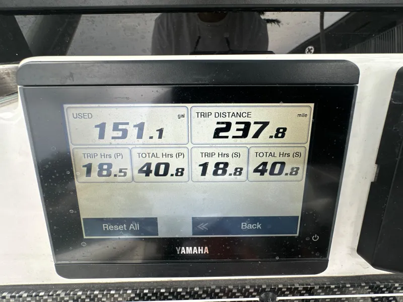 Slide: The Image of Yamaha display showing fuel usage and trip data for 2022 Tidewater 280 CC Adventure. - 26