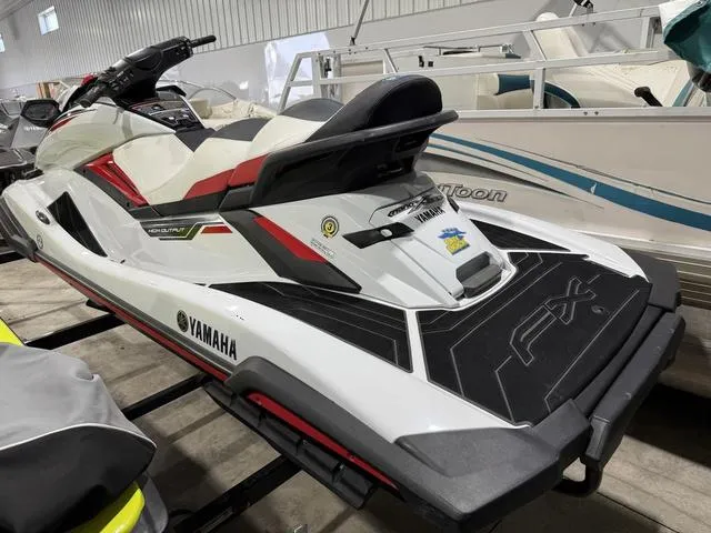Slide: The Image of 2020 Yamaha Waverunner FX Cruiser HO in a showroom, showcasing sleek design and features. - 3