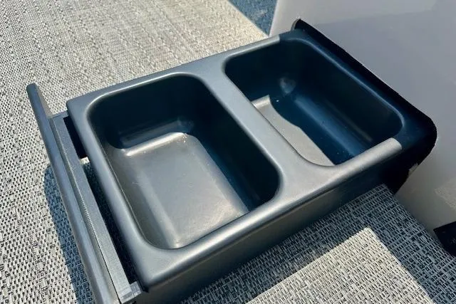 Slide: The Image of Dual-compartment storage tray in 2025 Barletta A22QC boat, ideal for organization. - 6