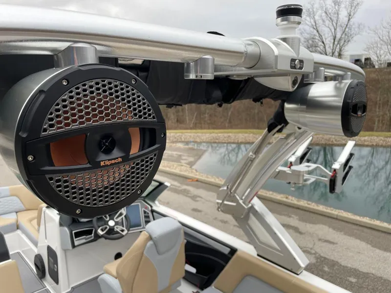 Slide: The Image of 2023 MasterCraft X24 boat with Klipsch speakers and sleek interior design. - 14