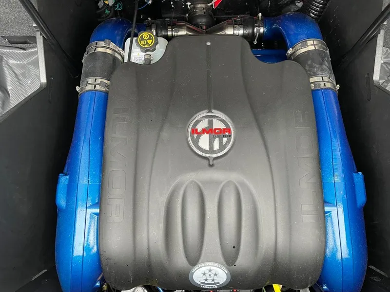 Slide: The Image of 2023 MasterCraft X24 engine with Ilmor branding, featuring blue and black components. - 16