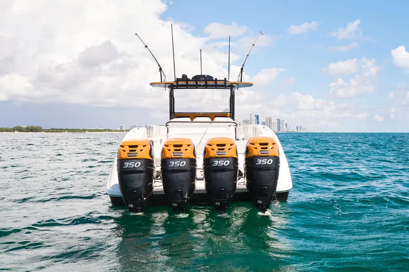 Slide: The Image of 2016 Midnight Express 43' Open boat with four powerful engines on the ocean. - 14