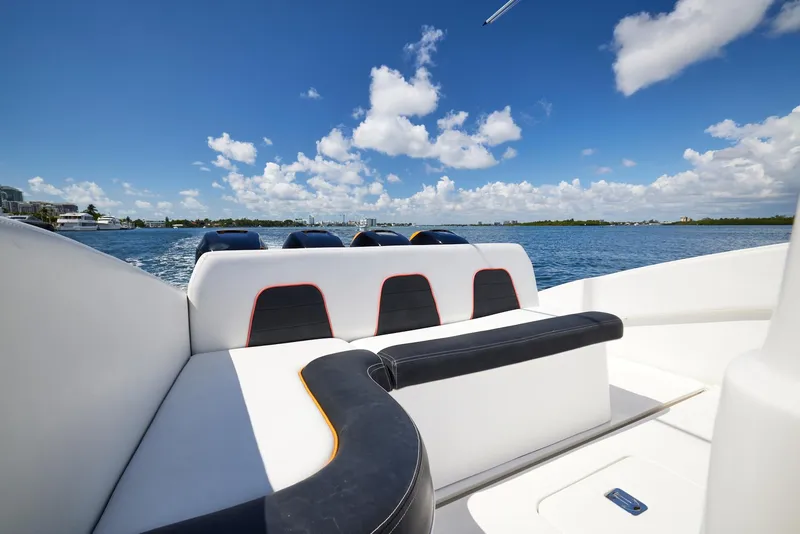 Slide: The Image of 2016 Midnight Express 43' Open boat interior with scenic water view. - 31