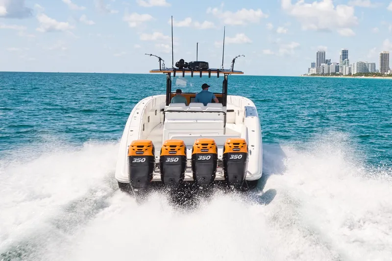 Slide: The Image of 2016 Midnight Express 43' Open boat cruising with four engines on open water. - 4