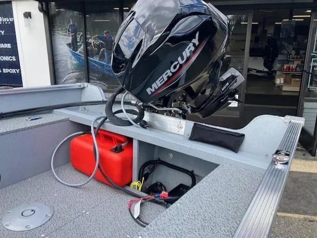 Slide: The Image of 2025 Lund 1600 Fury SS boat with Mercury outboard motor and red fuel tank. - 4