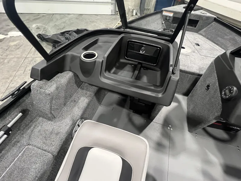 Slide: The Image of 2025 Princecraft Holiday 162 WS MAX boat interior with seating and storage. - 13