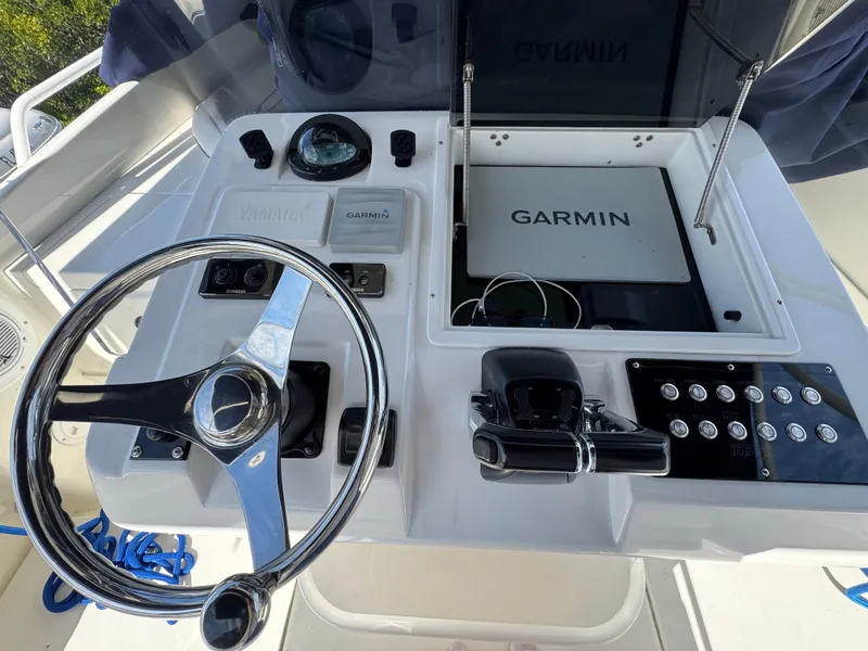 Slide: The Image of 1996 Intrepid 356 Cuddy helm with Garmin navigation and Yamaha controls. - 21