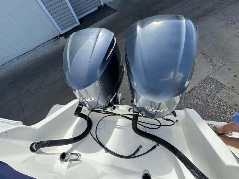 Slide: The Image of Twin Yamaha 300 outboard engines on a 1996 Intrepid 356 Cuddy boat. - 6