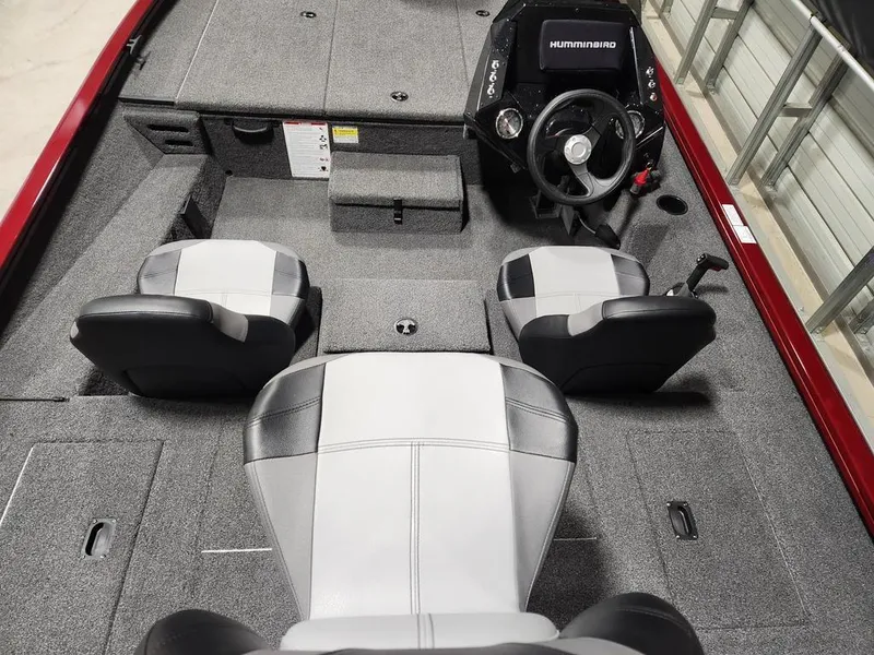 Slide: The Image of 2024 Crestliner XF 189 boat interior with seating and steering console. - 5