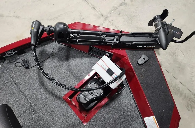 Slide: The Image of 2024 Crestliner XF 189 boat with Minn Kota trolling motor on red deck. - 8