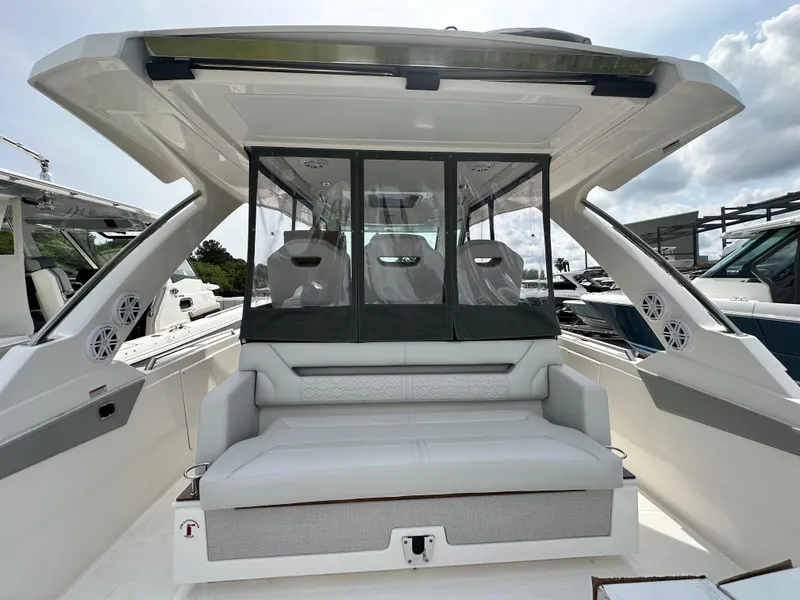 Slide: The Image of 2025 Tiara Yachts 34 LS luxury boat interior with seating and modern design. - 16