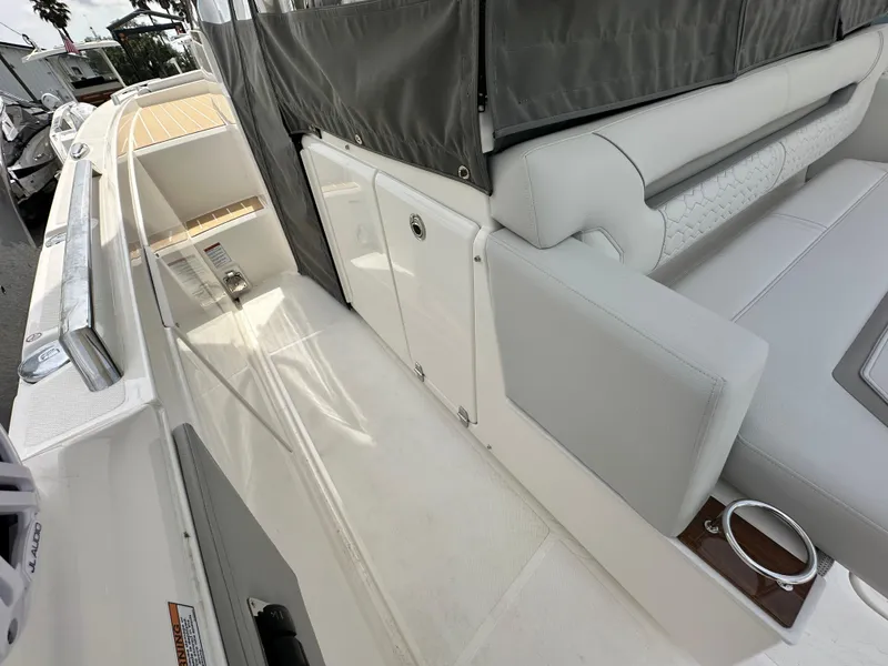 Slide: The Image of 2025 Tiara Yachts 34 LS interior with sleek seating and modern design. - 18