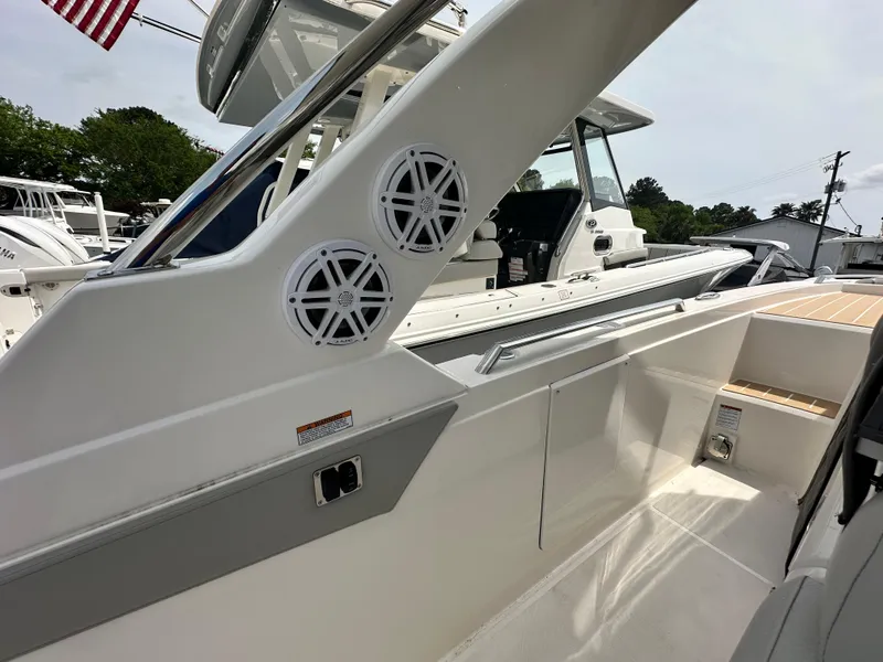 Slide: The Image of 2025 Tiara Yachts 34 LS boat, featuring sleek design and modern amenities. - 19