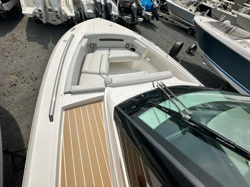 Slide: The Image of 2025 Tiara Yachts 34 LS boat with sleek design and spacious seating area. - 22