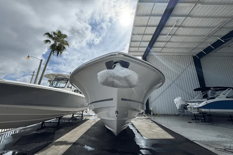 Slide: The Image of Boston Whaler 330 Outrage 2025 - 2
