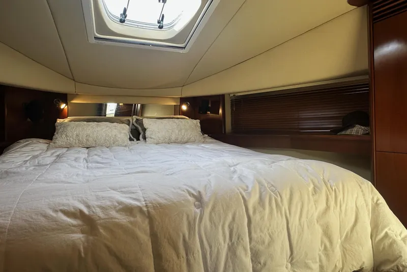 Slide: The Image of Luxurious cabin interior of 2006 Sea Ray 48 Sundancer yacht with skylight. - 21