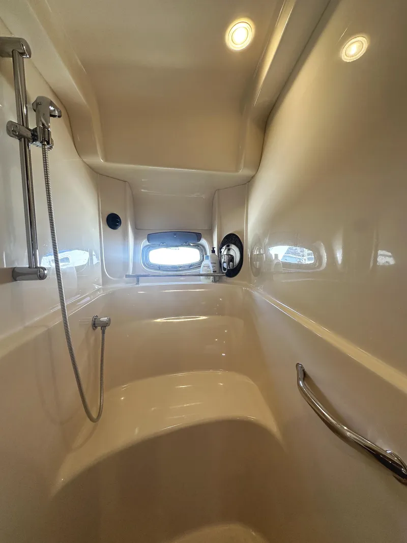 Slide: The Image of Interior shower of 2006 Sea Ray 48 Sundancer yacht, featuring sleek design and modern fixtures. - 23