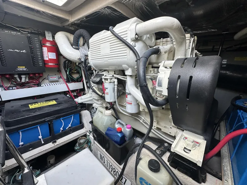 Slide: The Image of Engine room of 2006 Sea Ray 48 Sundancer with visible components and equipment. - 29